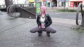 Well done and very slutty slut shows her ass in public while pissing between her legs